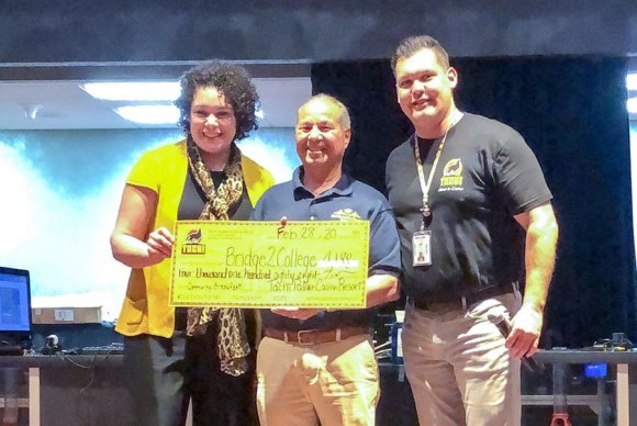 Tachi Palace Casino Resort monthly breakfast raises over $4,000 for Bridge2College From left to right, Noemi Valenzuela, Johnny Baltierra, Tachi Palace Casino Resort General Manager Michael Olujic.